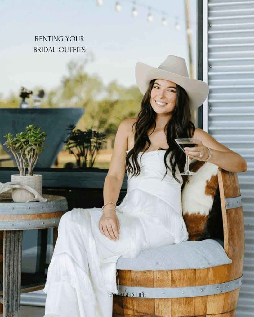 “Bride in chic white jumpsuit and hat showcasing bridal outfit rental trend by @rentbridalmaidco”