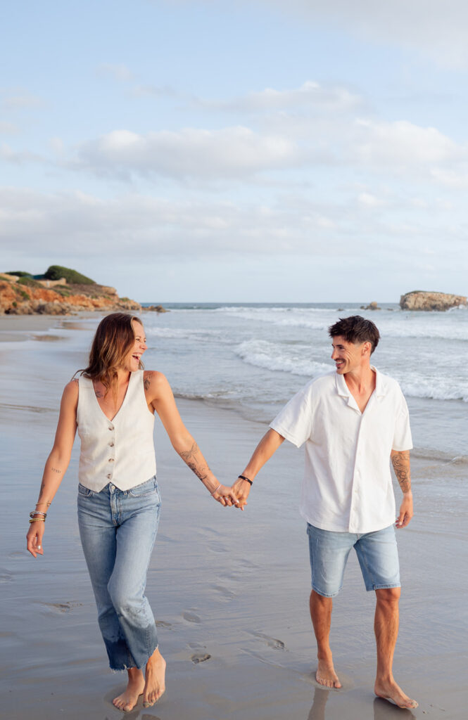 Anniversary session capturing movement and laughter on a Menorca beach
Natural coastal couple photography in Menorca by Elodie A Photography