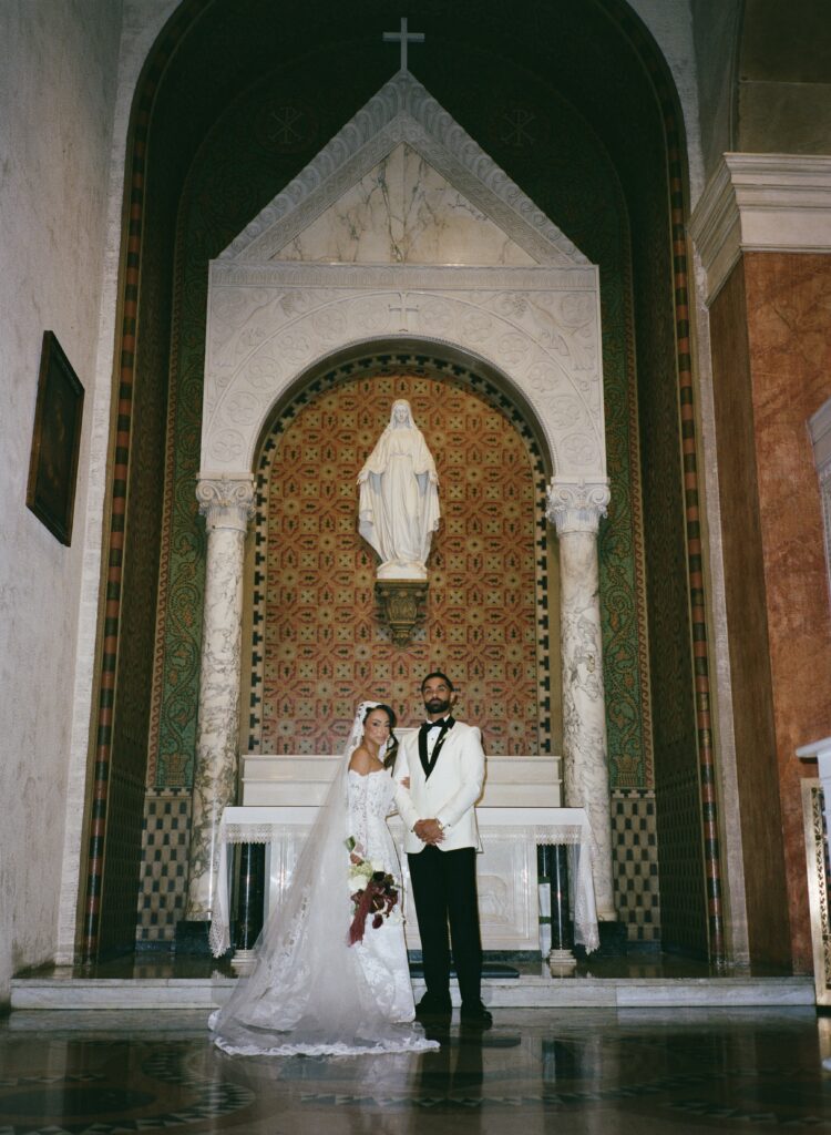 "Catholic wedding ceremony Los Angeles River Center bride groom portrait"