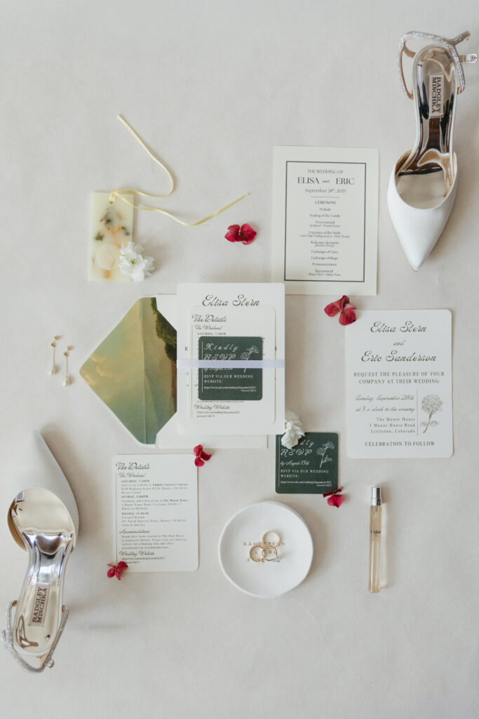 Wedding invitation flat lay for Elisa Stern and Eric Sanderson Manor House Littleton Colorado September 2025