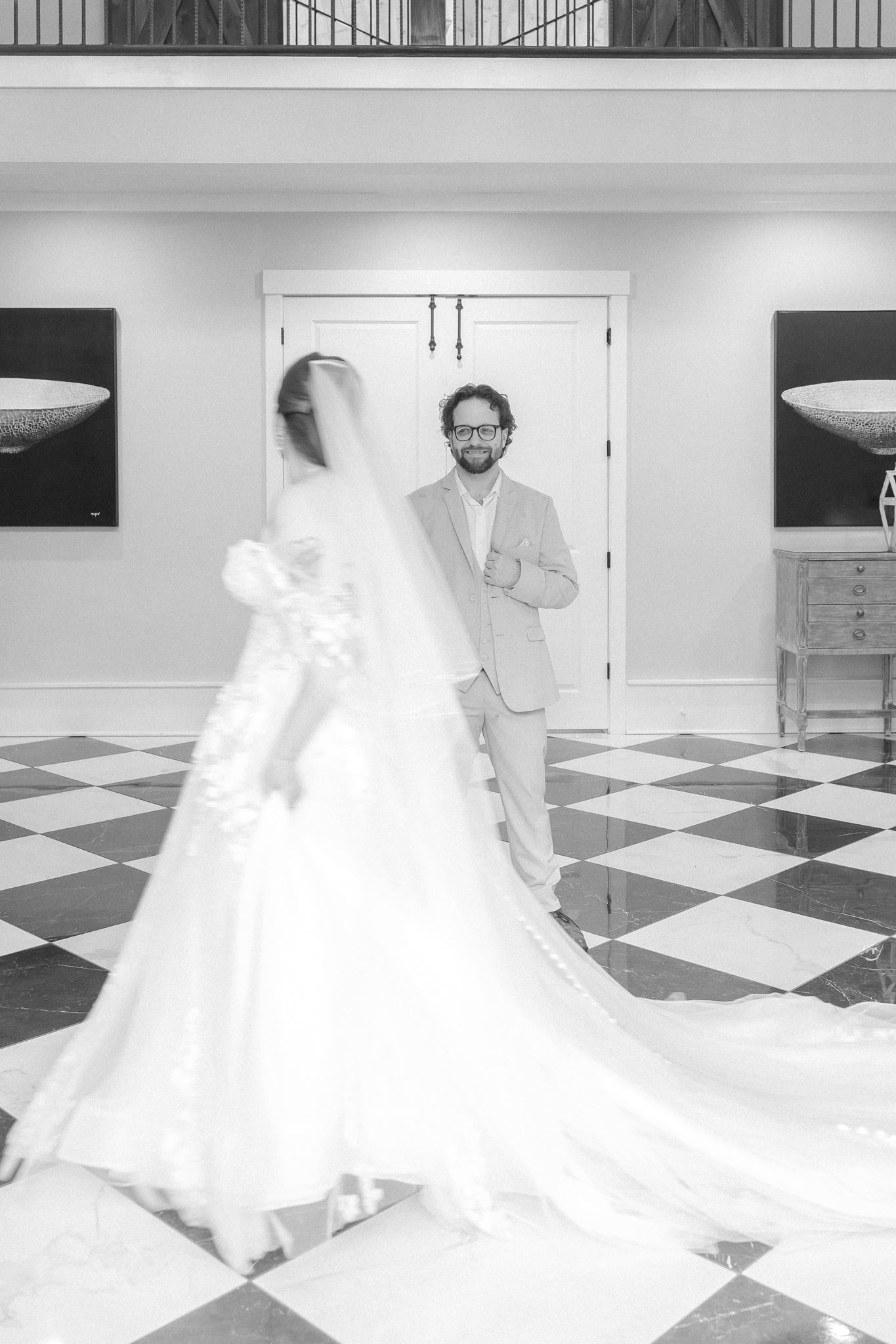 Black and white first look on the checkered floor