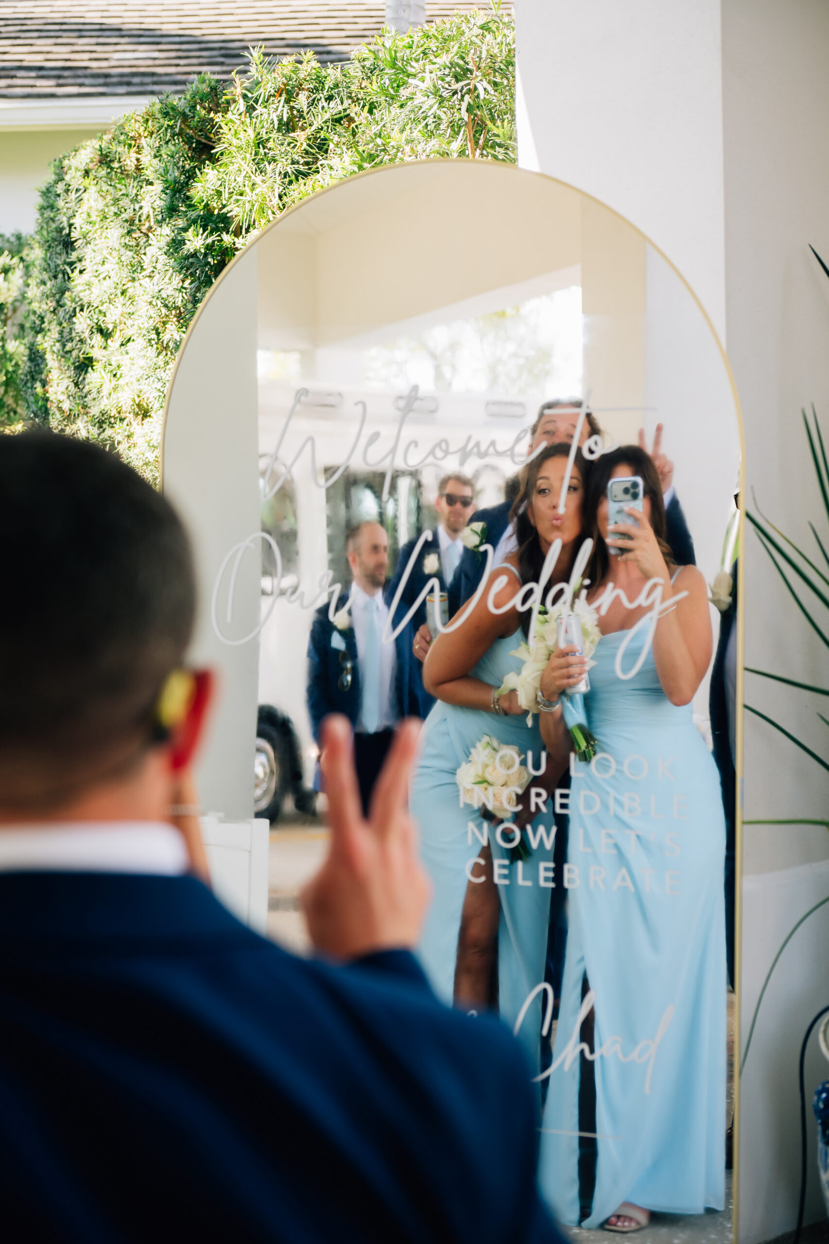 Mirror welcome sign greeting guests at the Pelican Club