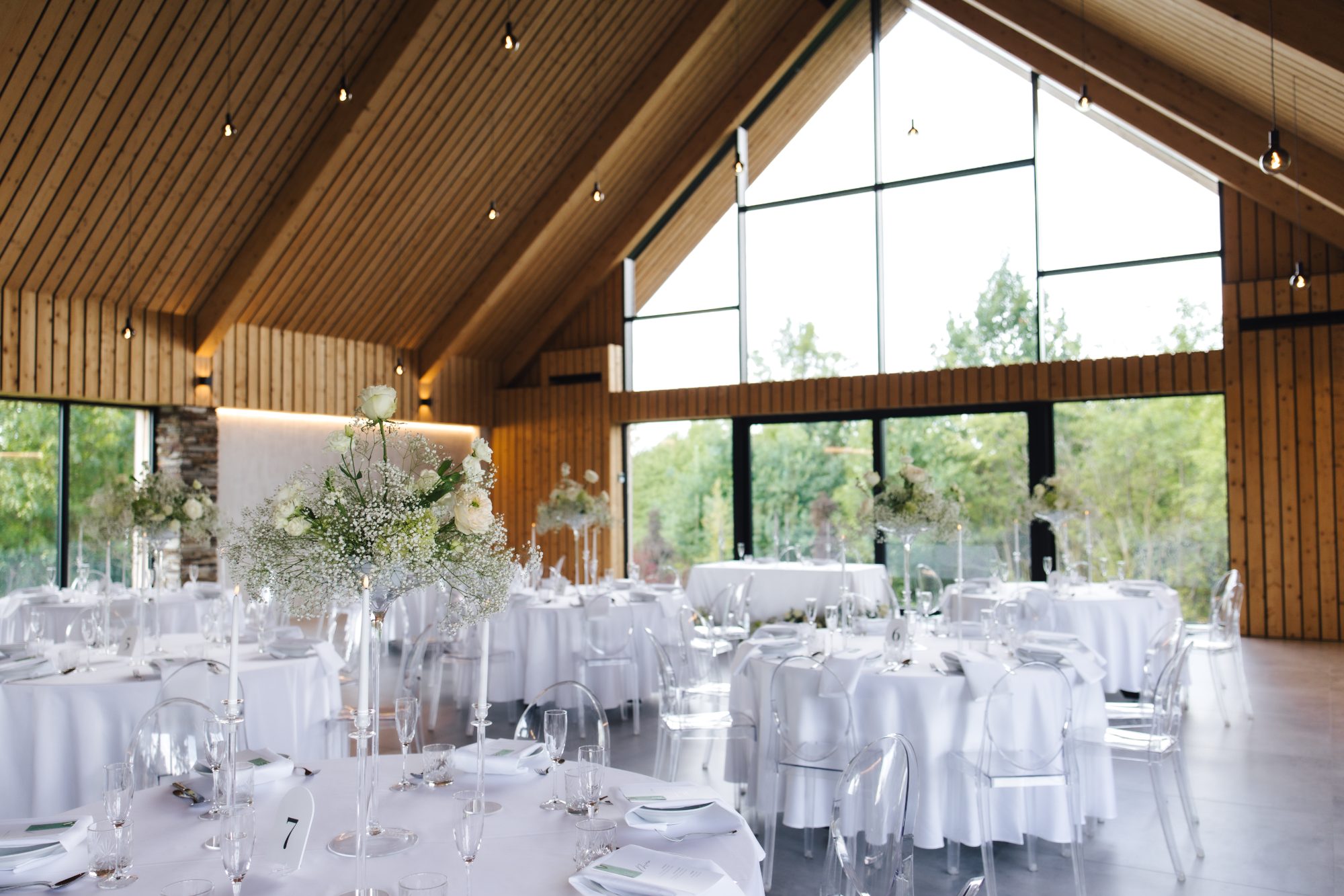 Wedding reception hall with glass gable windows at Samota Pierre in the Czech Republic